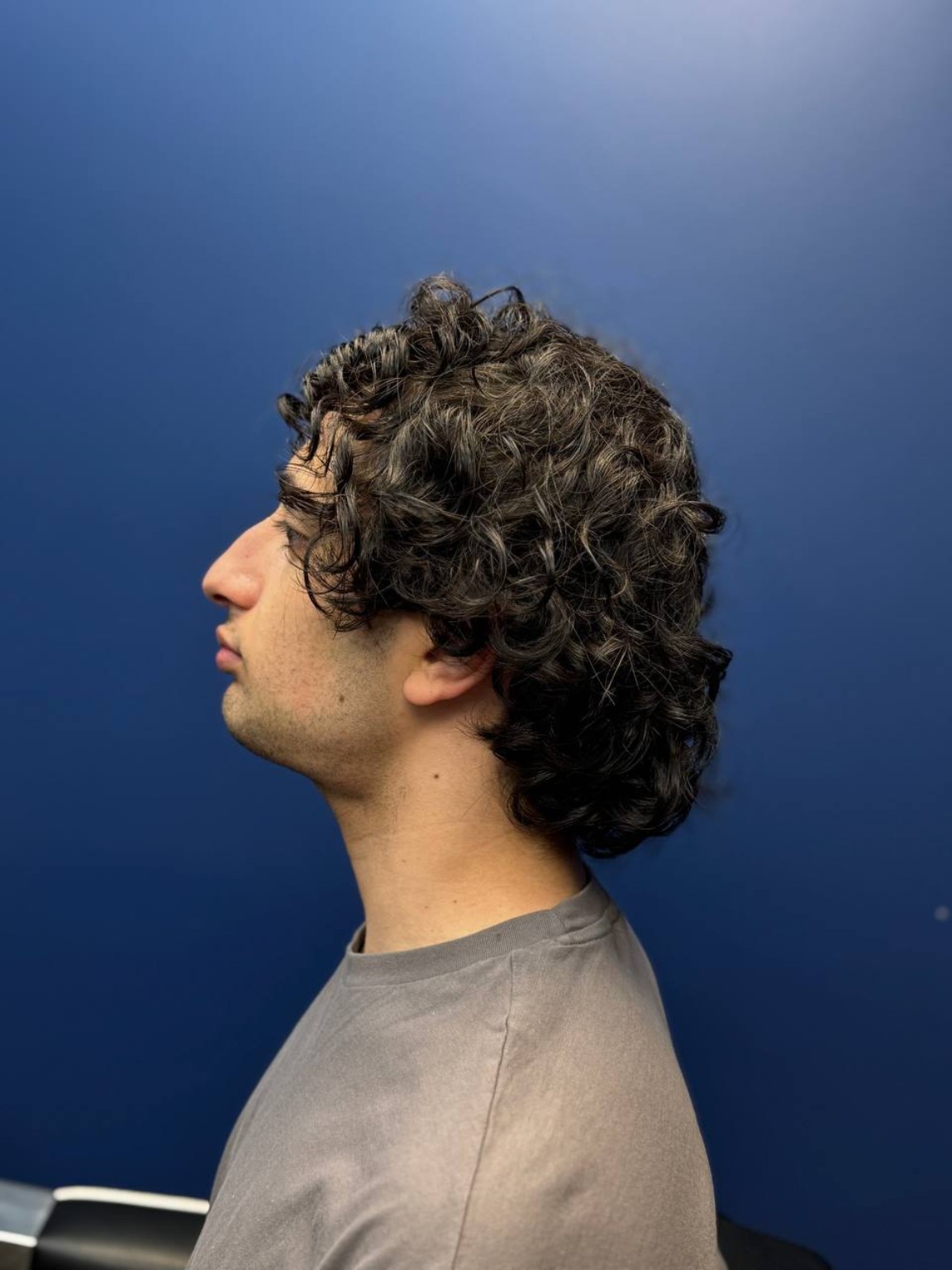 Long curly hair before the haircut