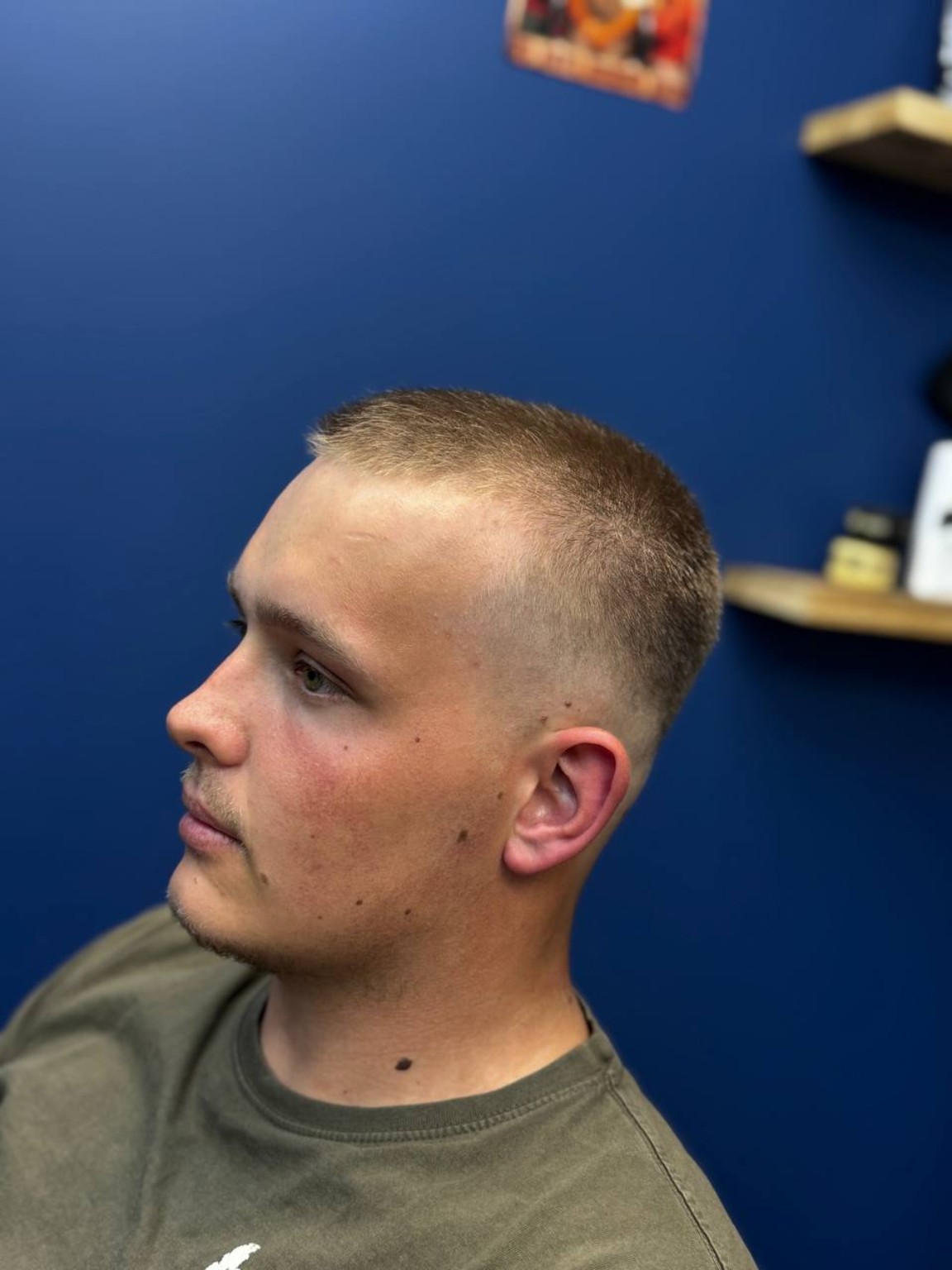 Short blond fade after the haircut