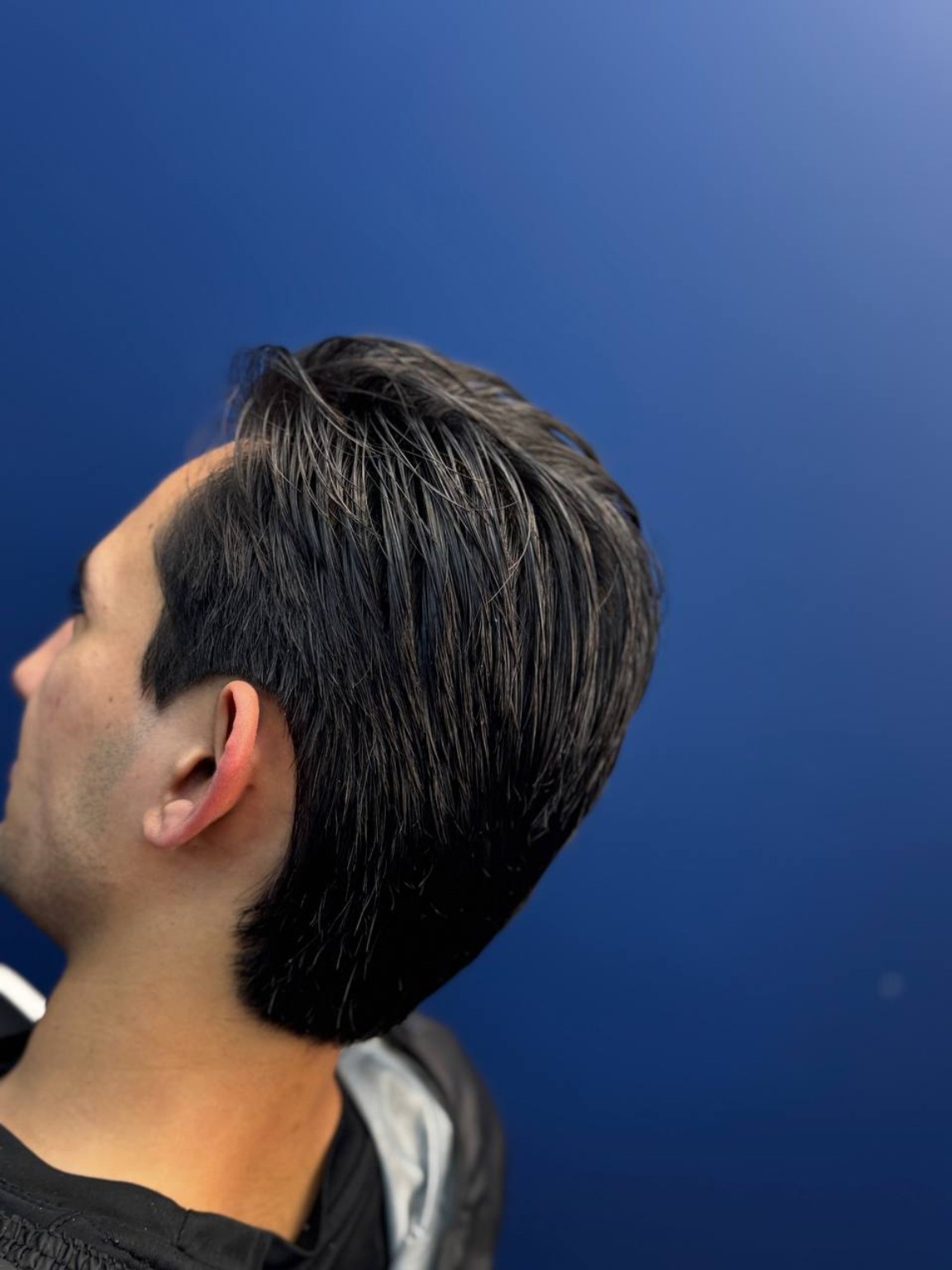 Finished slick-back haircut